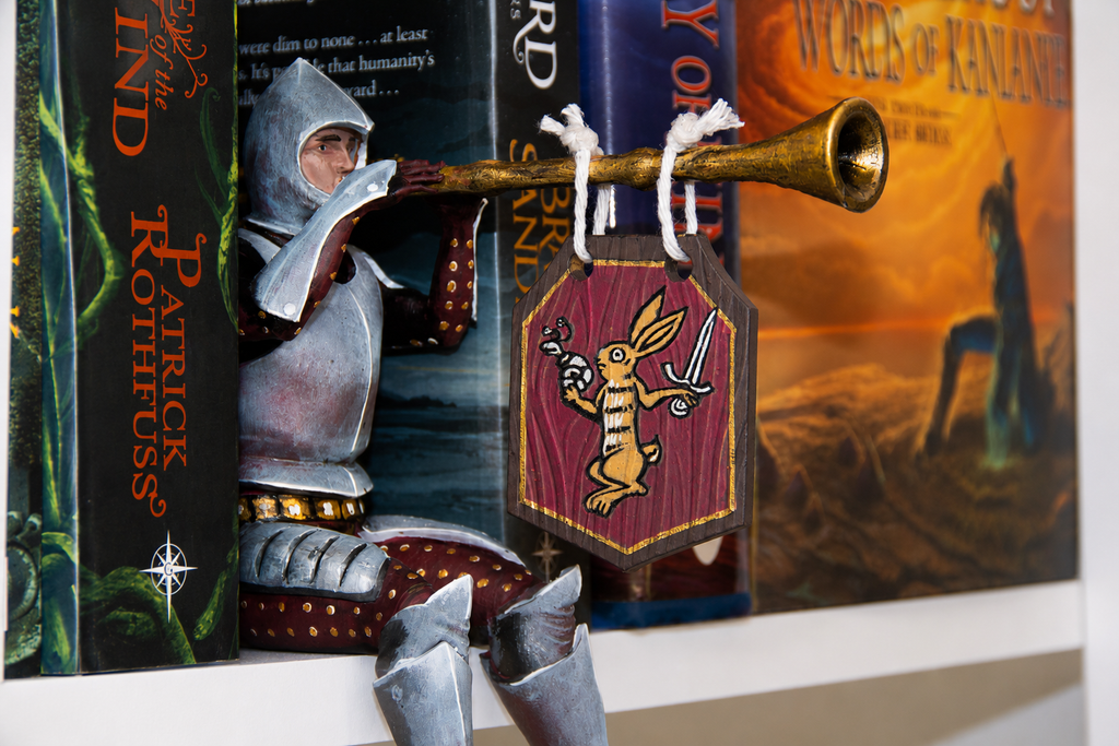 Bookshelf Guardian with Butt Trumpet Banner