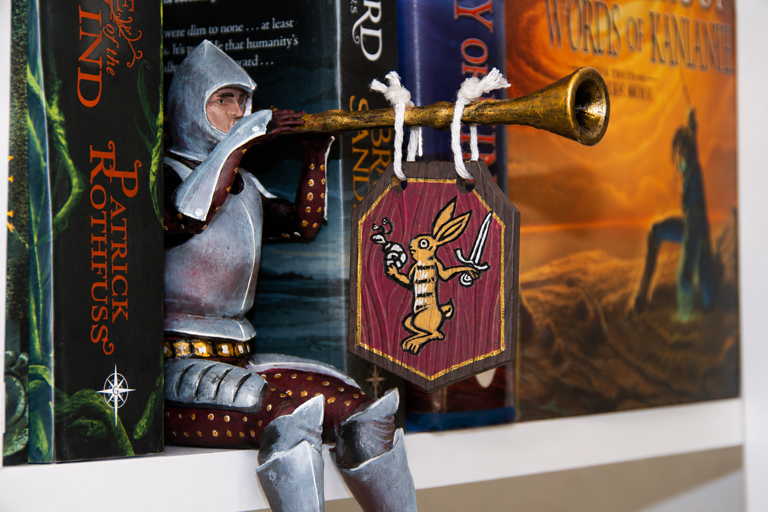 Bookshelf Guardian with Butt Trumpet Banner