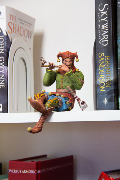 Bookshelf Court Jester playing a flute