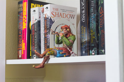 Bookshelf Court Jester playing a flute